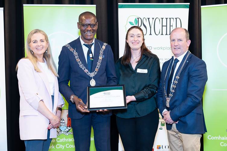 Mary Garde accepting PSYCHED recognition on behalf of The Radisson Hotel